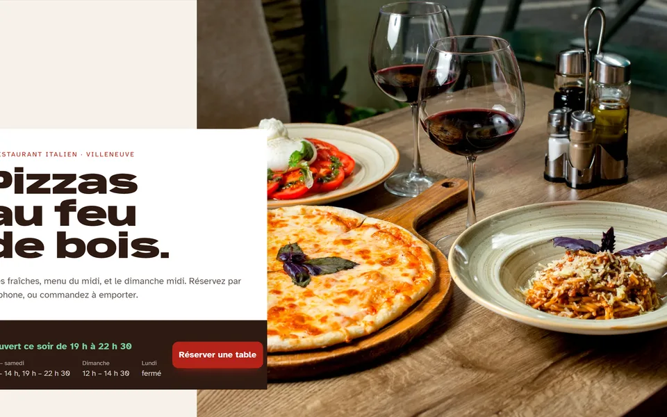 Nouveau site : la photo sur toute la largeur, sous le titre « Pizzas au feu de bois. ».